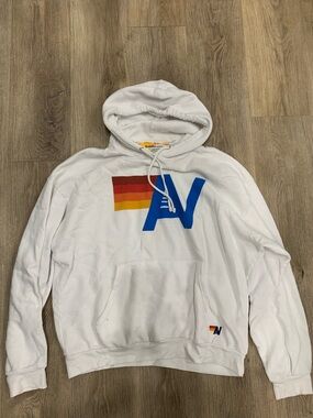 Aviator Nation White Hoodie with Blue and Red Chest Graphic and Yellow Tag